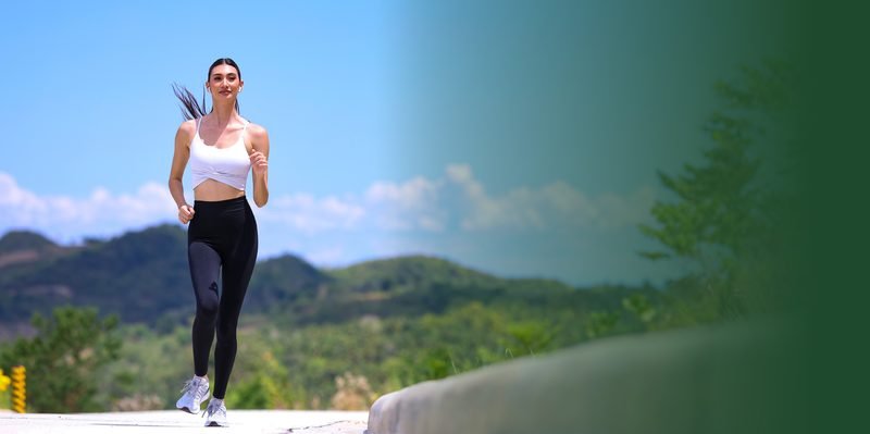 Jogger on a mountain road setting at Foressa Mountain Town